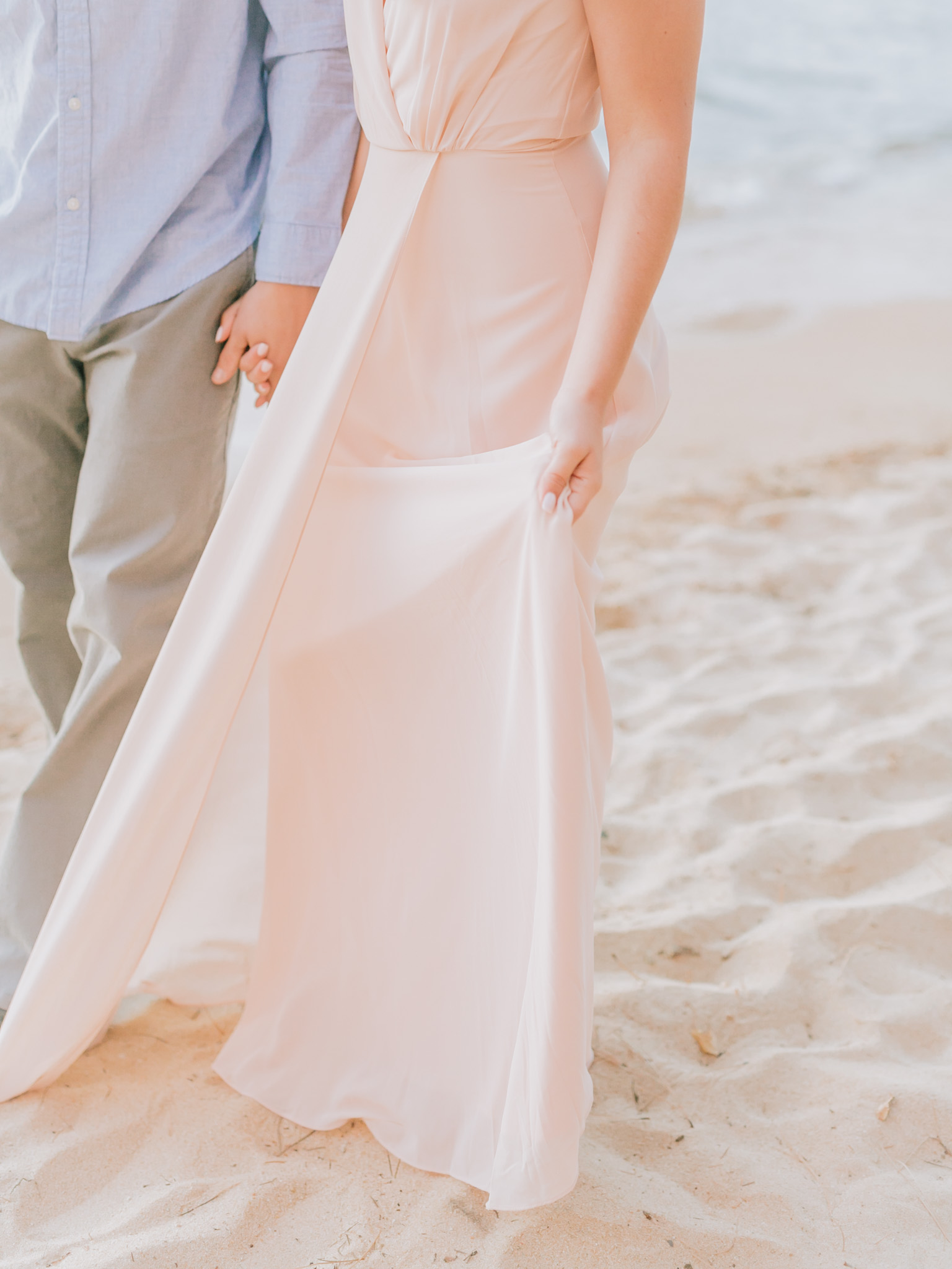 lake tahoe beach engagement session with blush dress