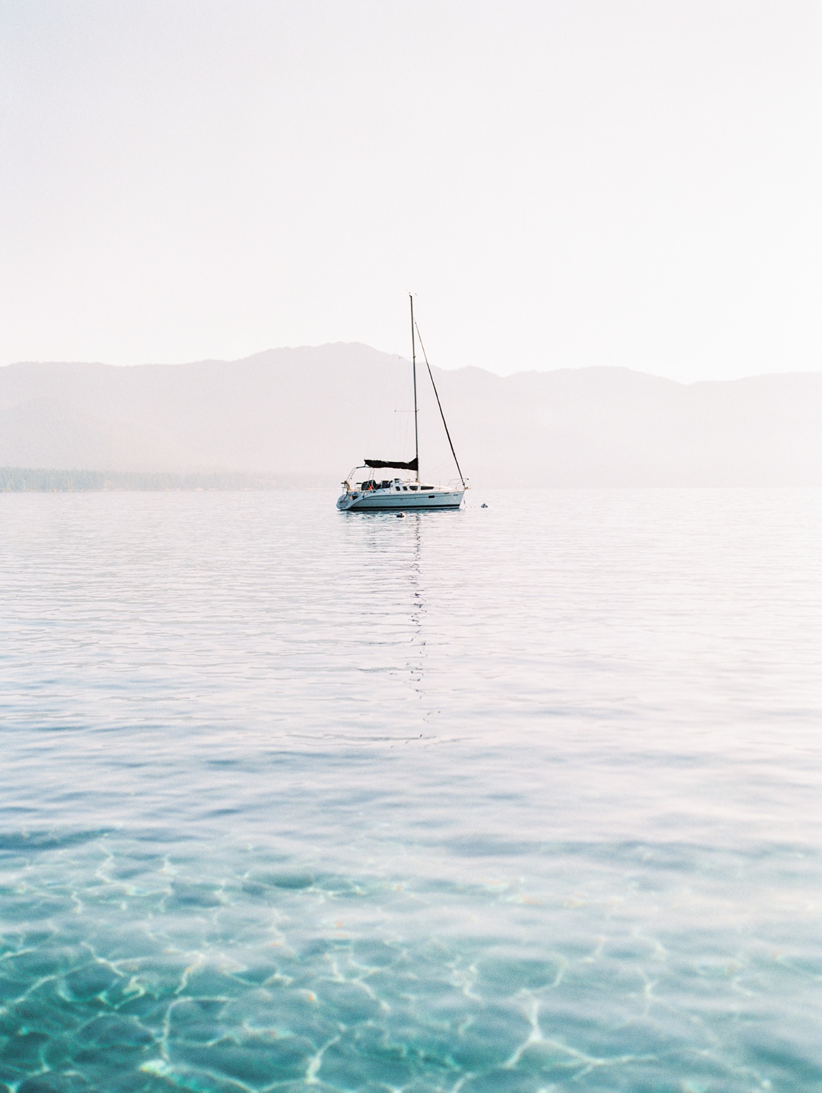 Sailboat On Lake Tahoe by wedding photographer Mandy Ford