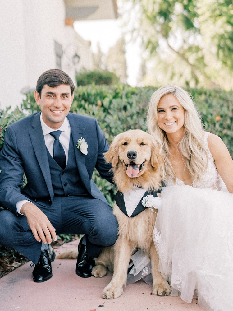 Bride and groom portrait with dog | Dogs at weddings